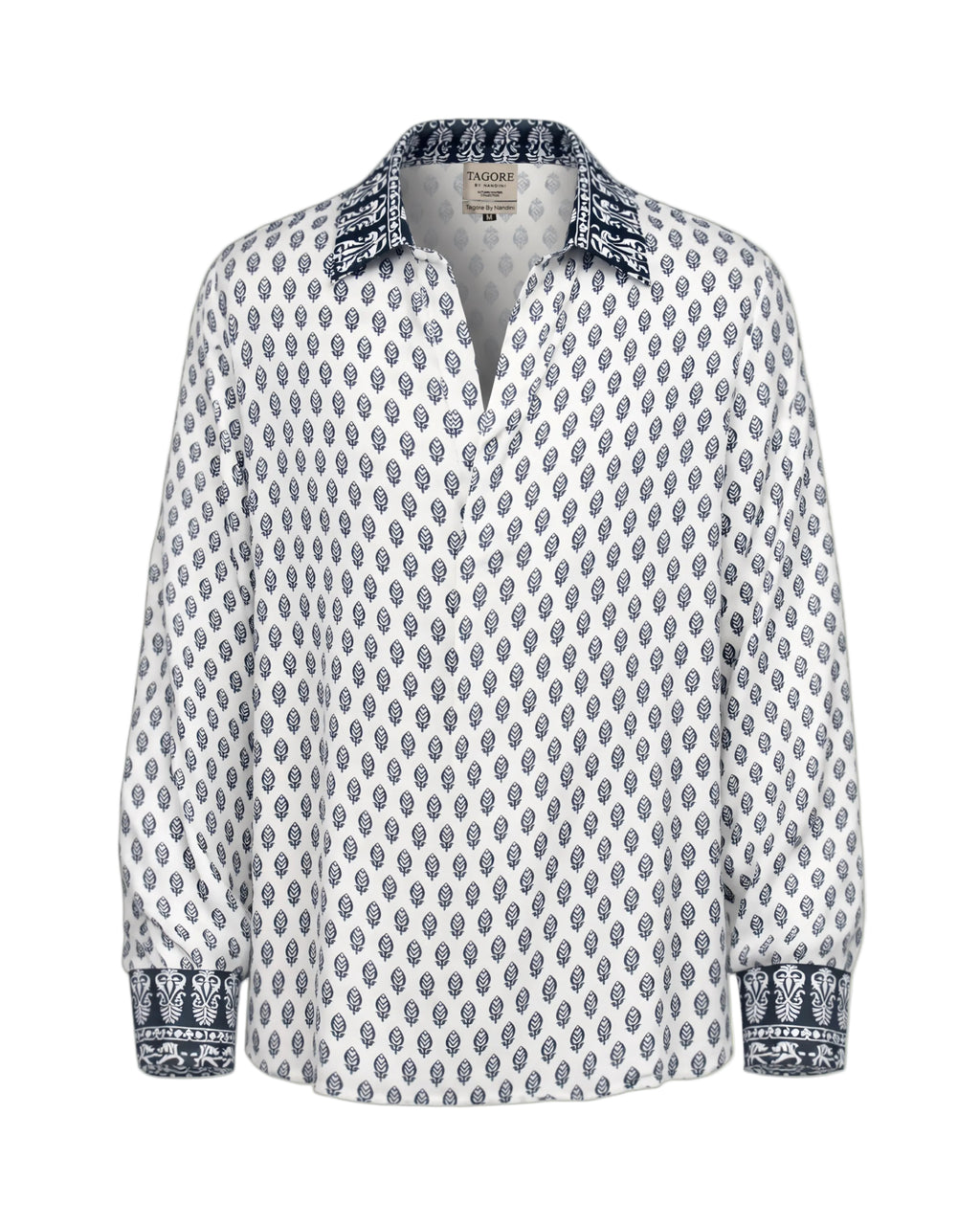White shirt with blue pattern on a beige background