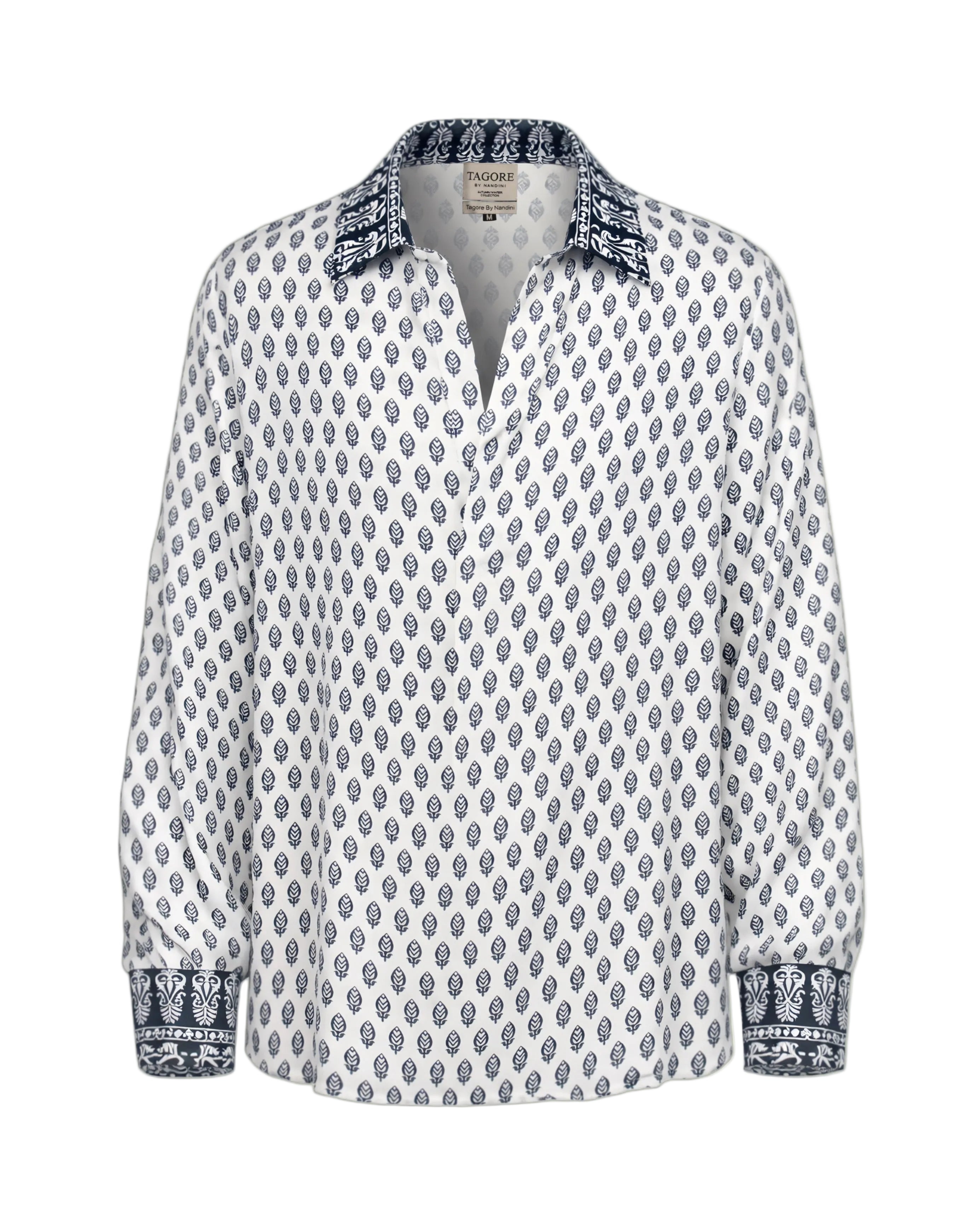 White shirt with blue pattern on a beige background