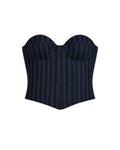 Navy blue strapless top with thin white stripes on a beige background