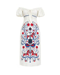 White dress with colorful floral embroidery on a white background