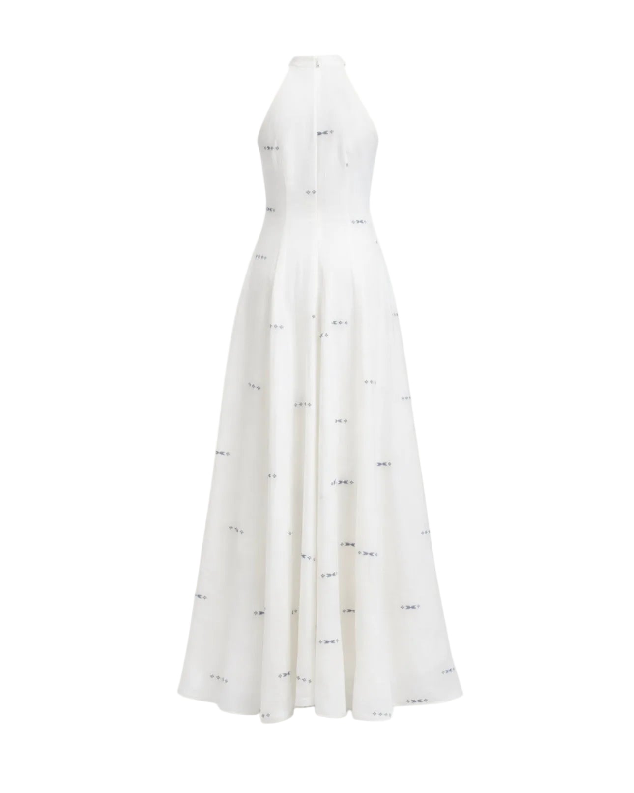 White dress with black patterns on a light beige background